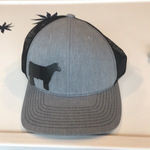Hat with cow on the front